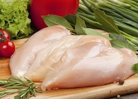 Fresh raw chicken  fillet  and vegetables prepared for cooking